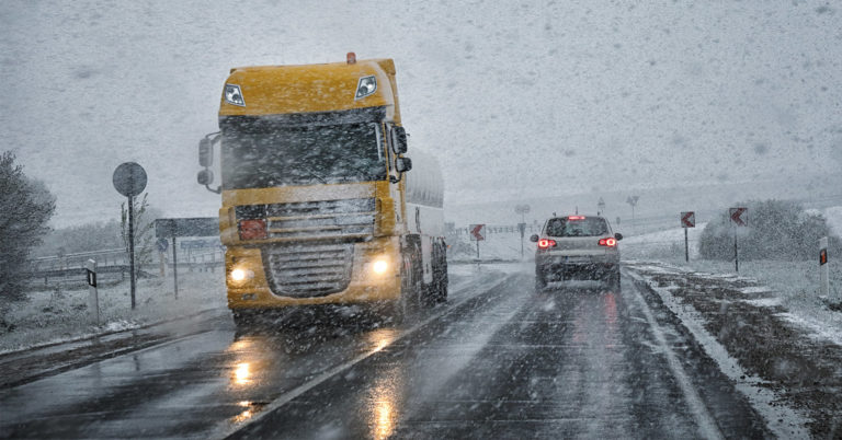 Vehicles driving in wintery conditions