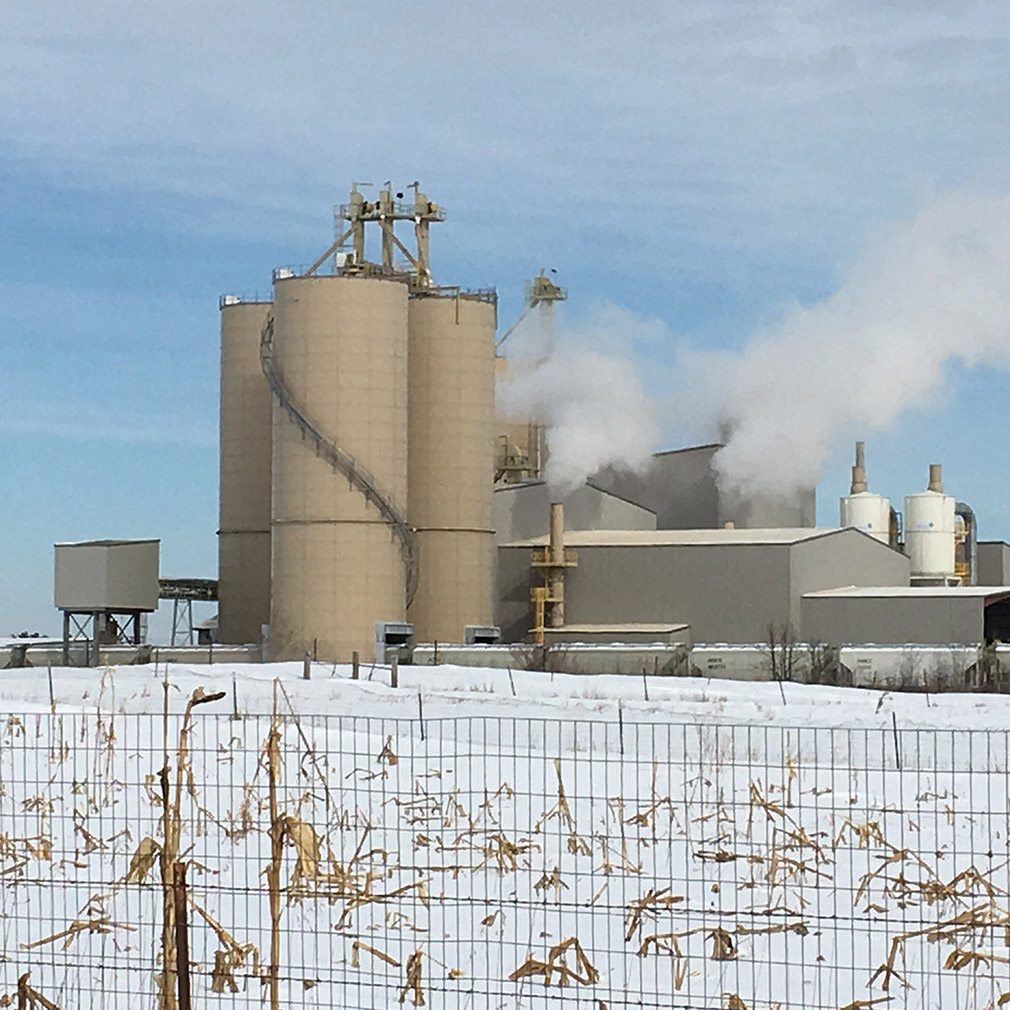 Industrial facility against a wintery landscape