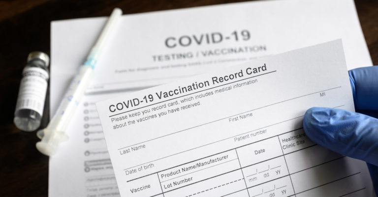 Image depicting COVID-19 vaccination card