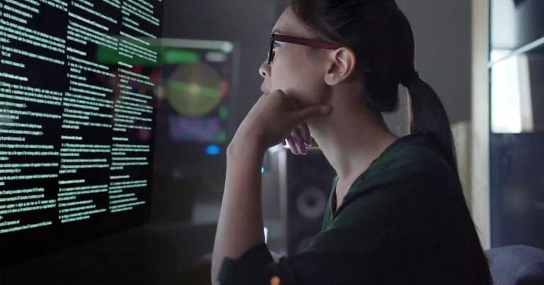 Woman looking at monitor