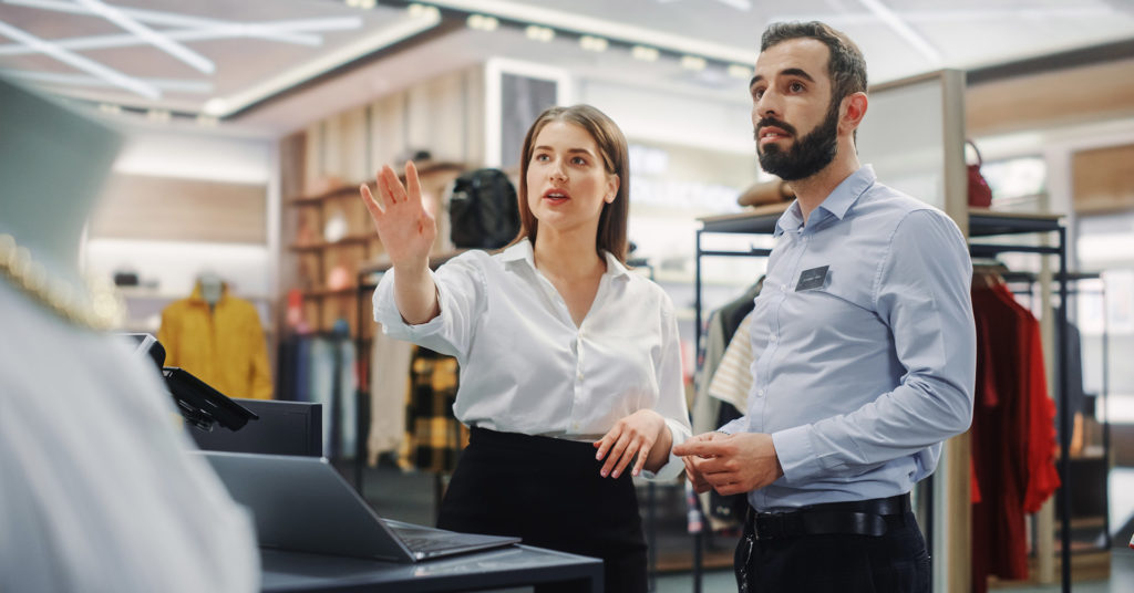 Store employees discuss safety procedures