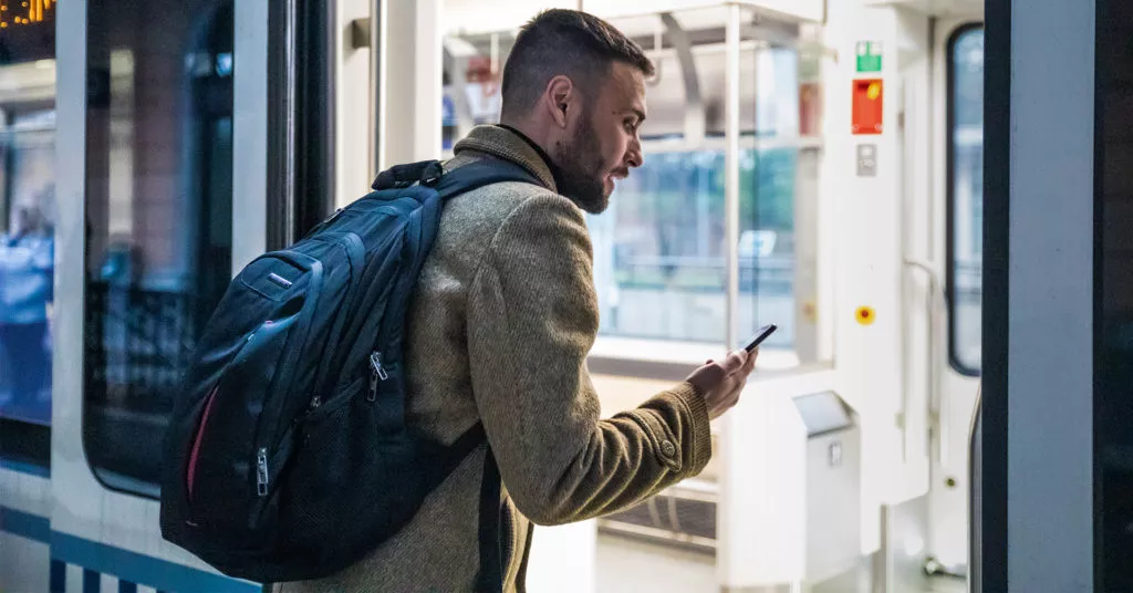 Traveler boarding a train