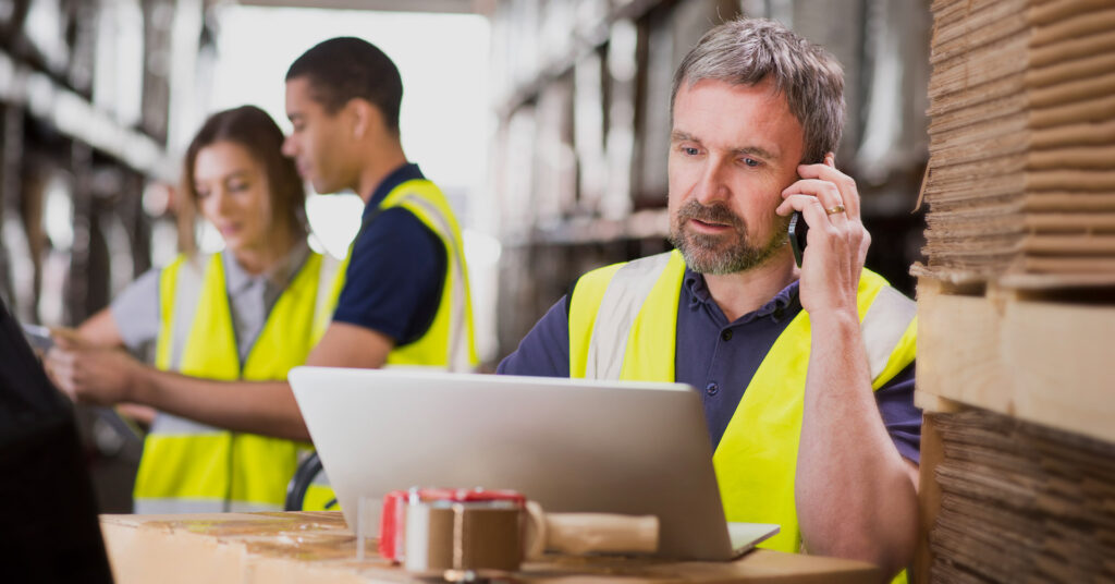 Workers in hi-vis vests